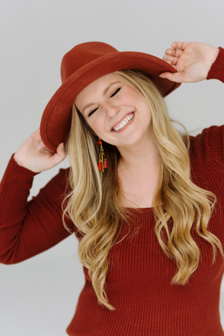 Ashland Wedding Photographer stephanie jenkins Photo posing for portrait in red shirt