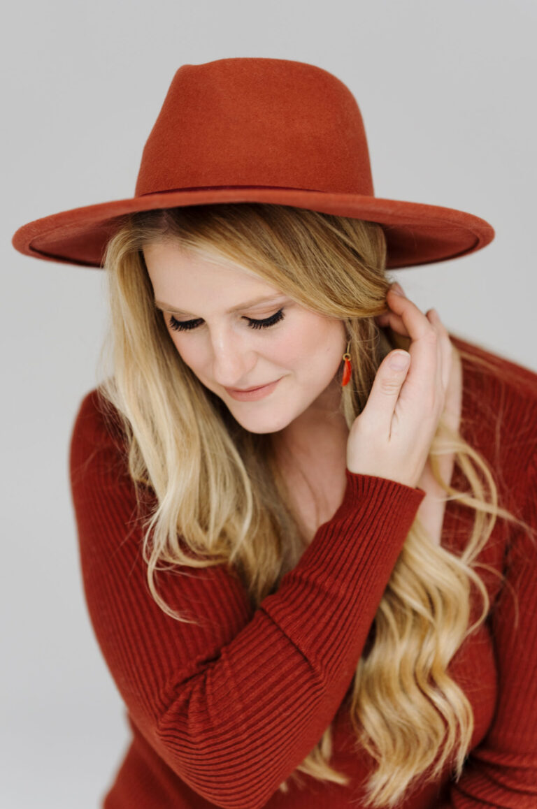 Powhatan Wedding Photographer Stephanie Jenkins Photo Posing in red shirt and red hat